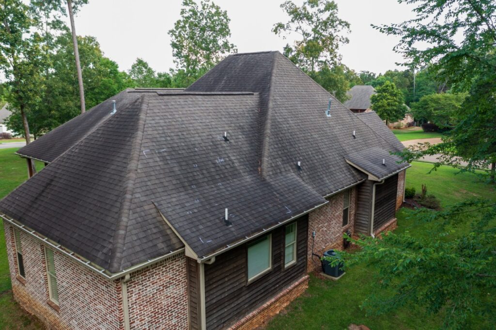 Roof with hail damage and chalk markings from inspection